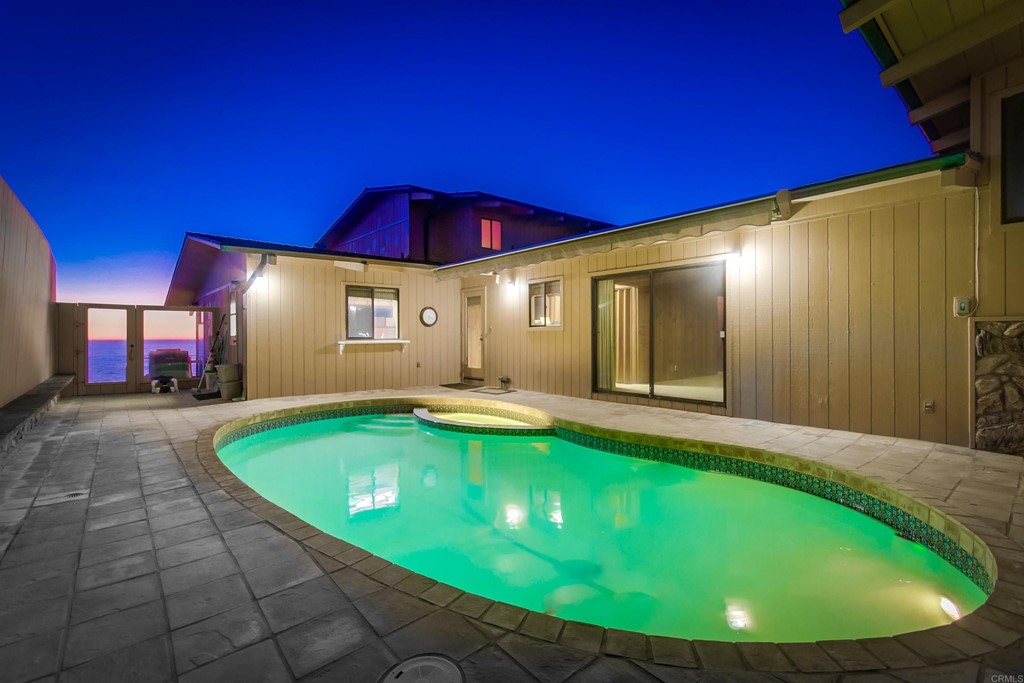 1236 Neptune Avenue Encinitas, CA 92024 - Photo 6 of 40 a view of a pool with a slide