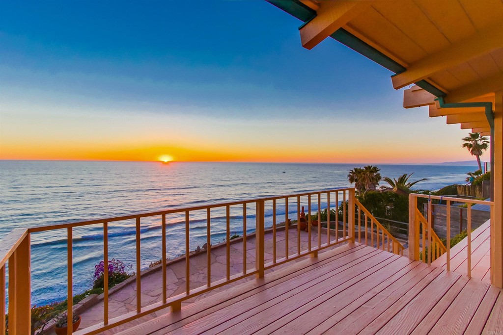 1236 Neptune Avenue Encinitas, CA 92024 - Photo 7 of 40 a view of a balcony with wooden floor and fence