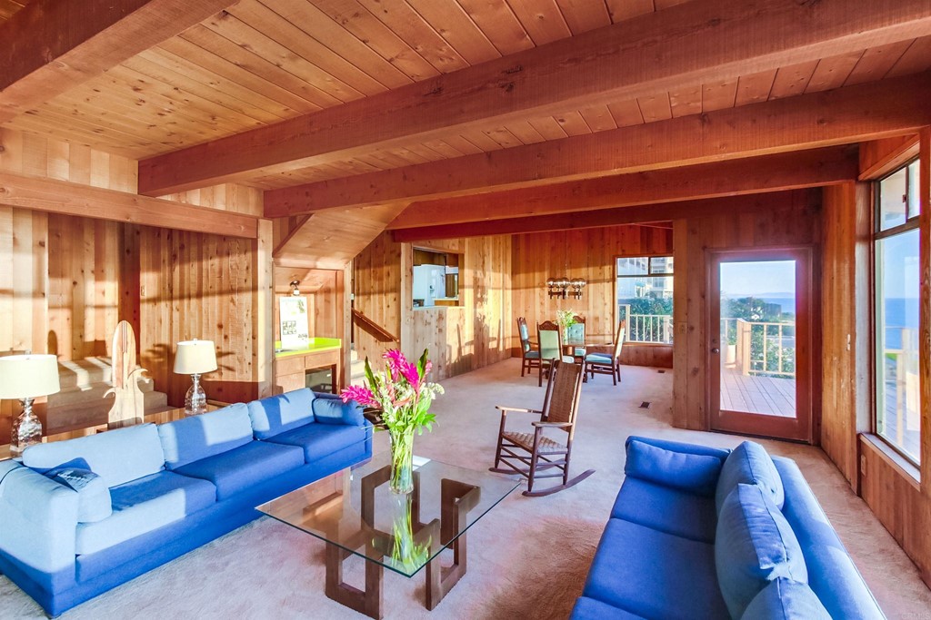 1236 Neptune Avenue Encinitas, CA 92024 - Photo 10 of 40 a living room with furniture and a large window