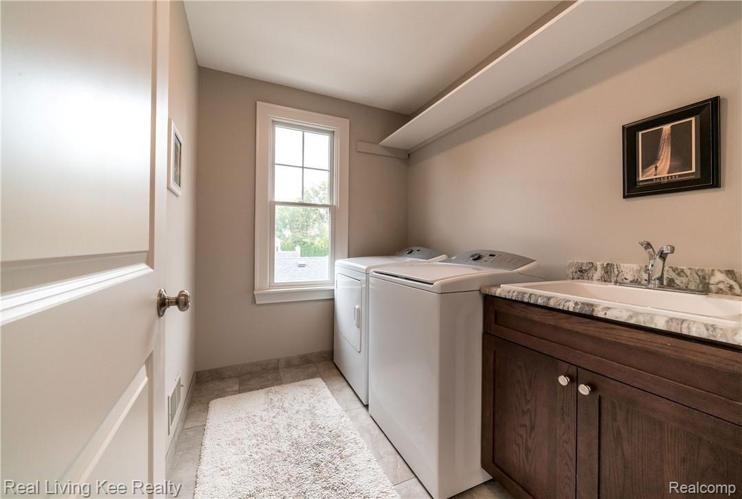 211 North Alice Avenue Rochester, MI 48307 - Photo 23 of 42 second floor laundry room with laundry sink/tub