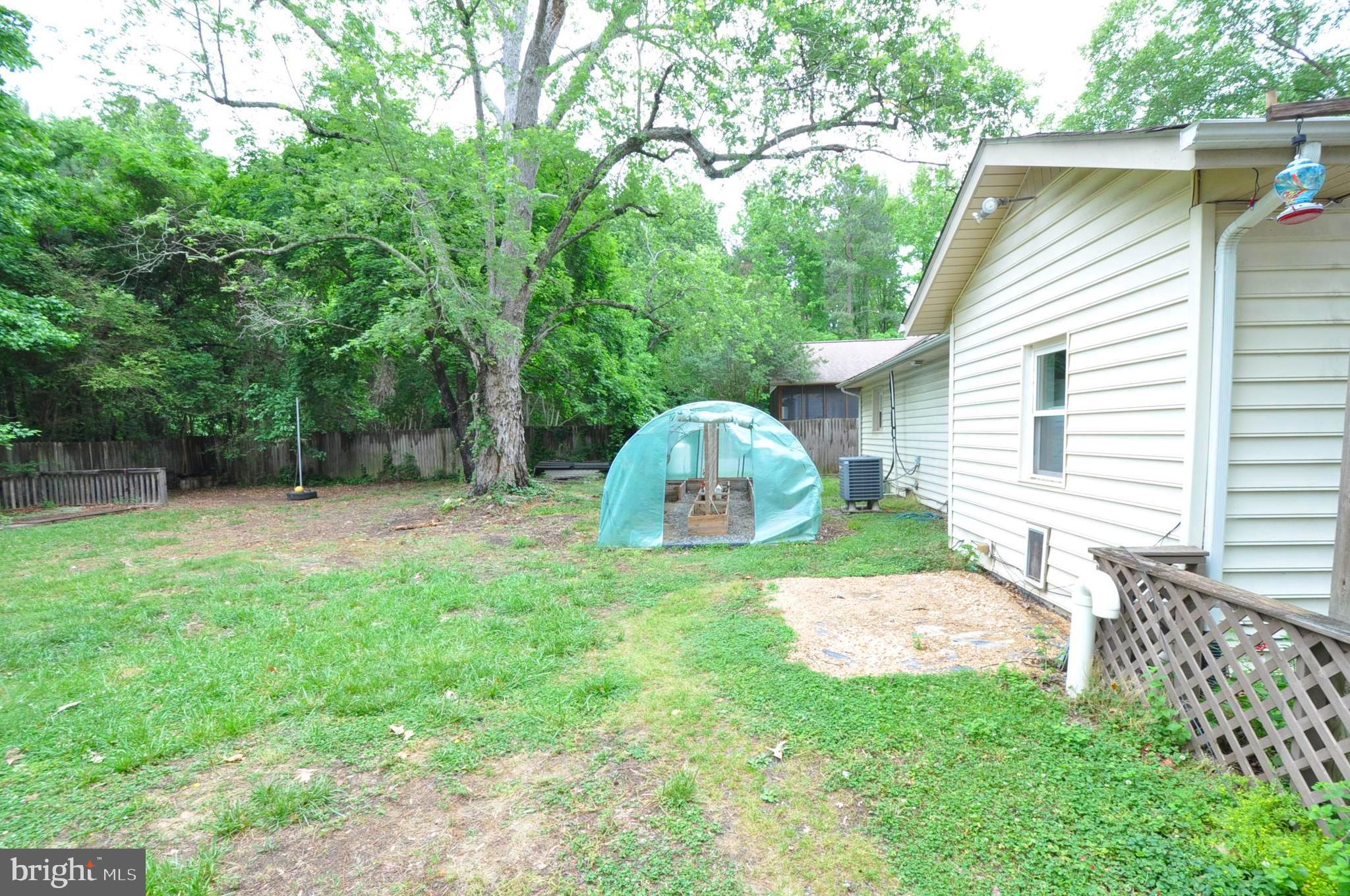 797 Forest Grove Road Colonial Beach, VA 22443 - Photo 28 of 40 Rear with Green Greenhouse