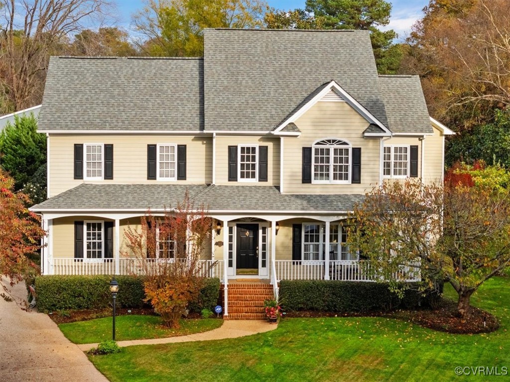 8104 Lower Ralston Road Henrico, VA 23229 - Photo 1 of 49 a front view of a house with a yard
