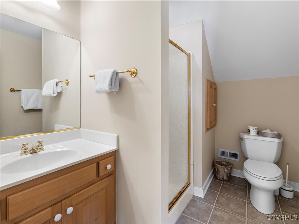 8104 Lower Ralston Road Henrico, VA 23229 - Photo 36 of 49 a bathroom with a sink toilet and a mirror