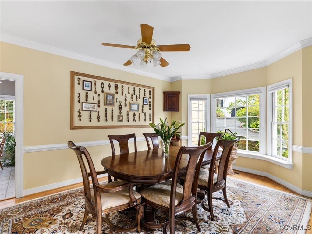 8104 Lower Ralston Road Henrico, VA 23229 - Photo 10 of 49 a view of a dining room with furniture window and wooden floor