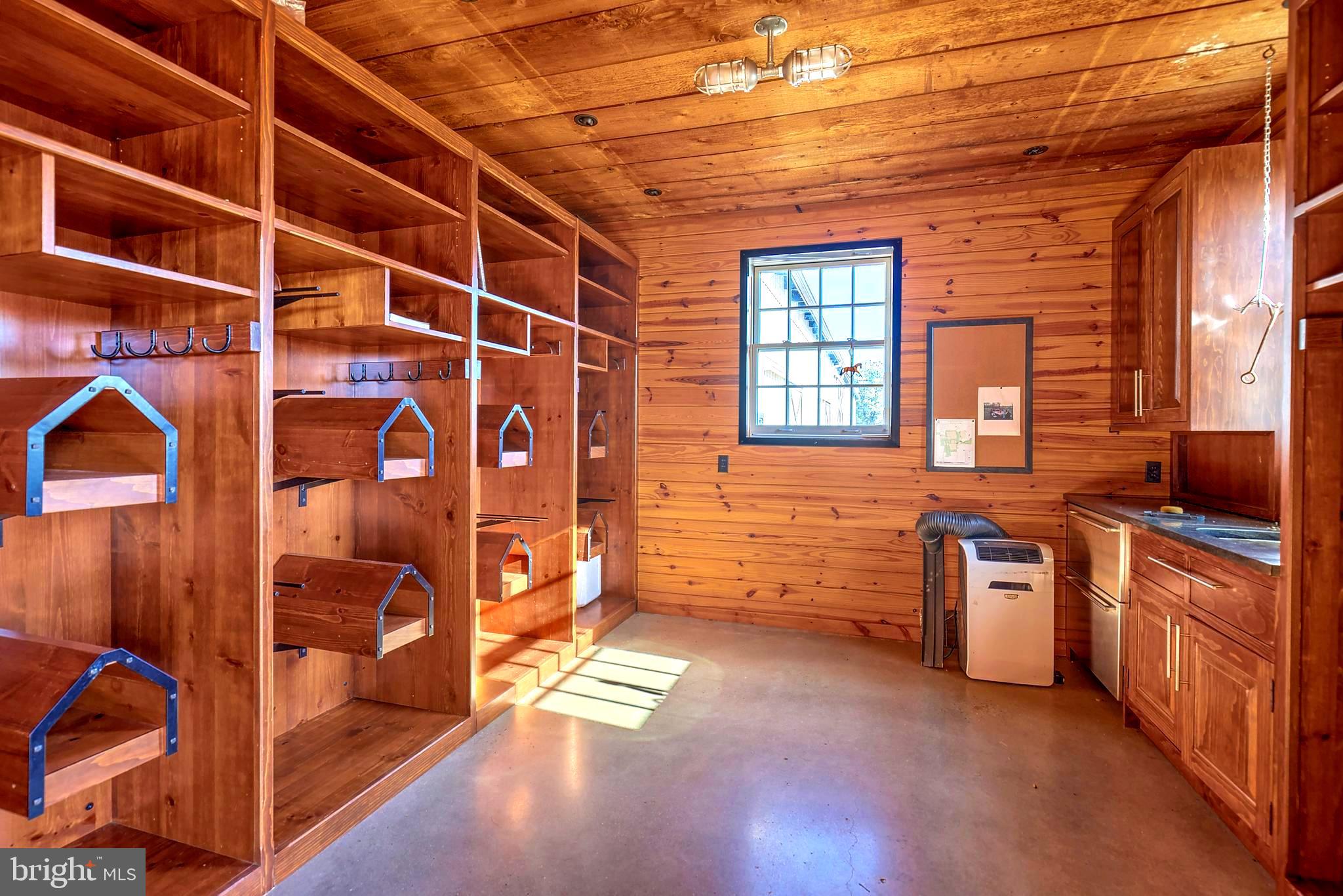 266 Province Line Road Skillman, NJ 08558 - Photo 17 of 71 a view of a kitchen with stainless steel appliances wooden cabinets and a stove top oven