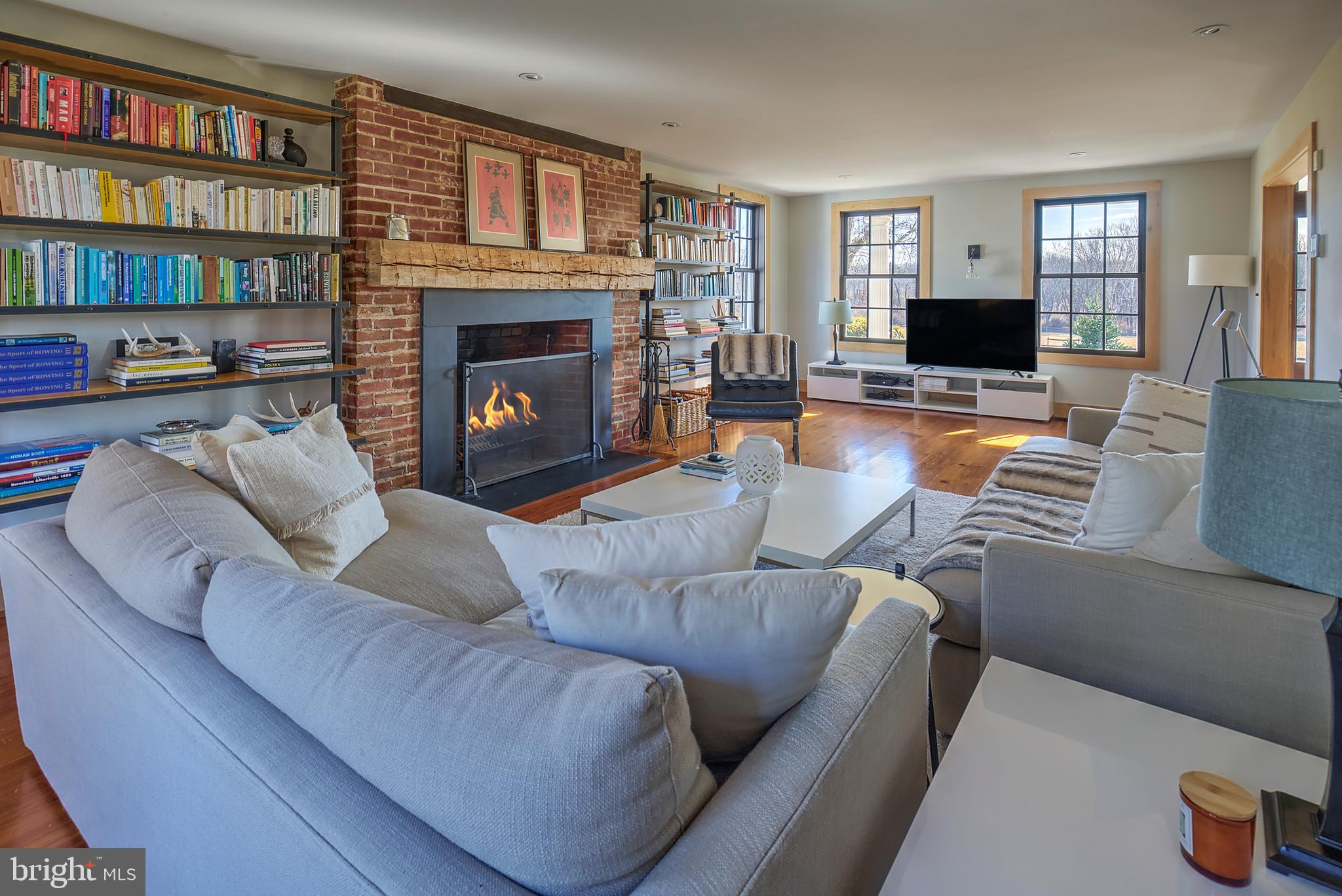 266 Province Line Road Skillman, NJ 08558 - Photo 30 of 71 a living room with furniture and a fireplace