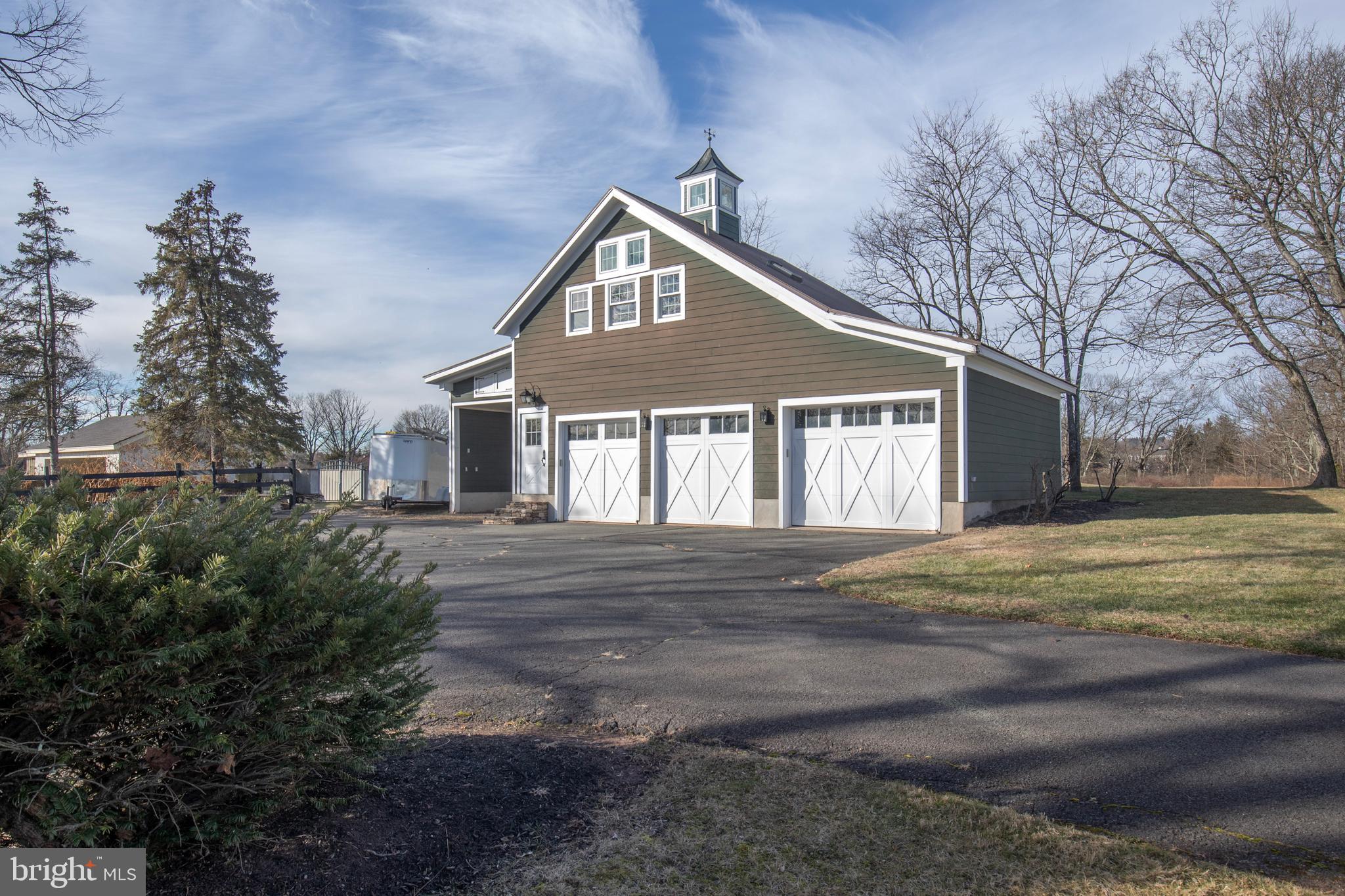 266 Province Line Road Skillman, NJ 08558 - Photo 44 of 71 a front view of a house with a yard