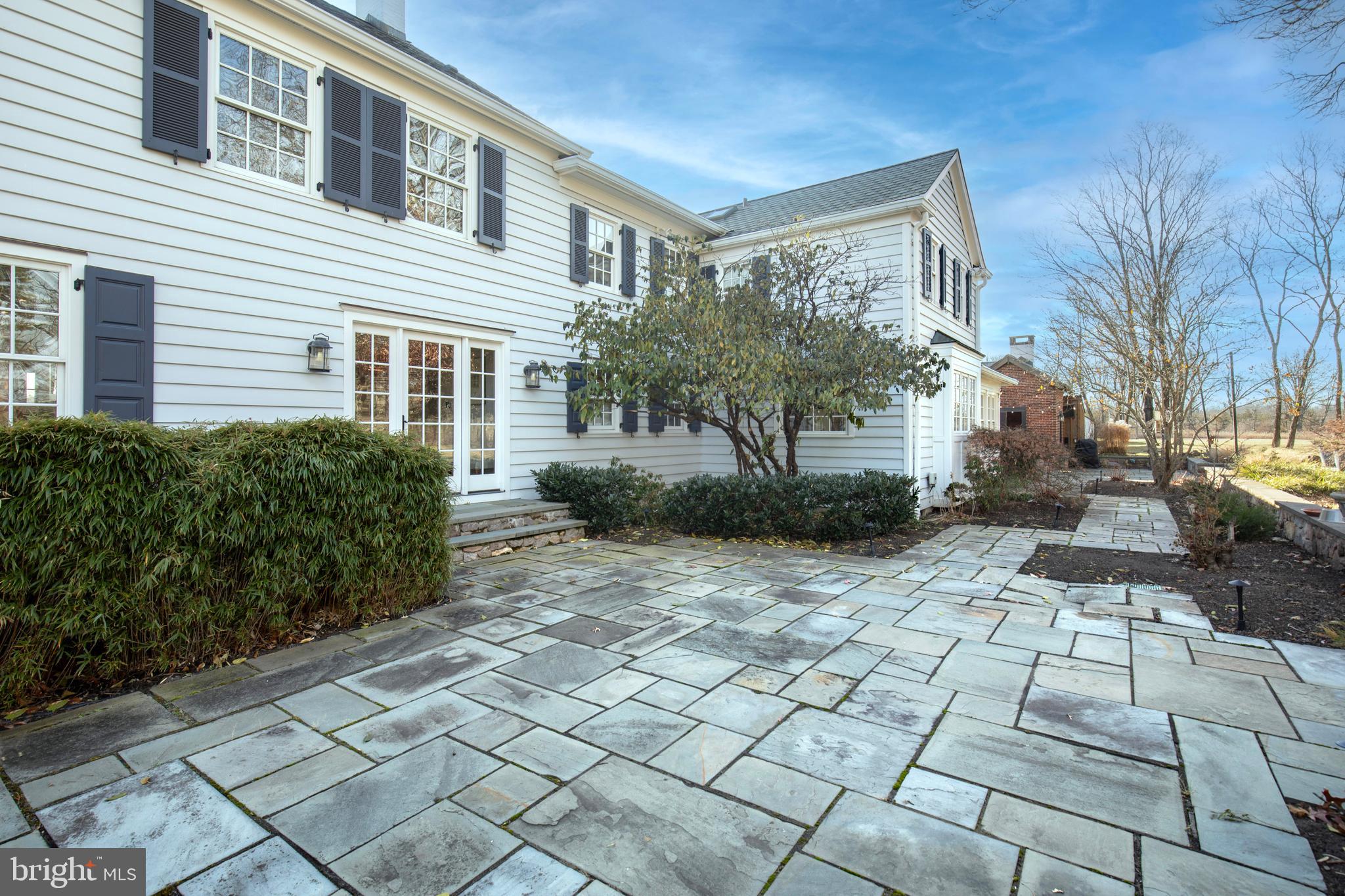 266 Province Line Road Skillman, NJ 08558 - Photo 47 of 71 Exterior Back Main House with slate patio