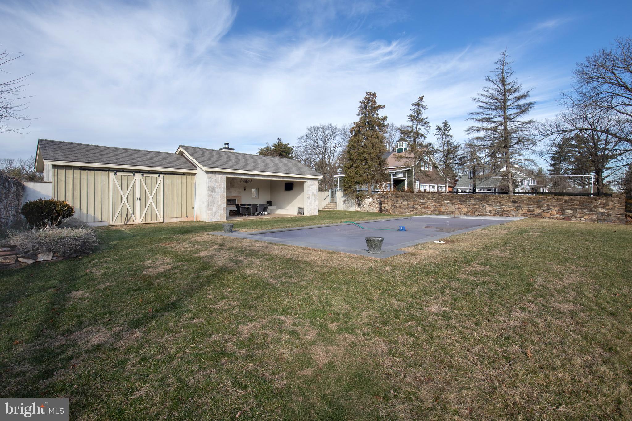 266 Province Line Road Skillman, NJ 08558 - Photo 71 of 71 a front view of a house with a yard and trees