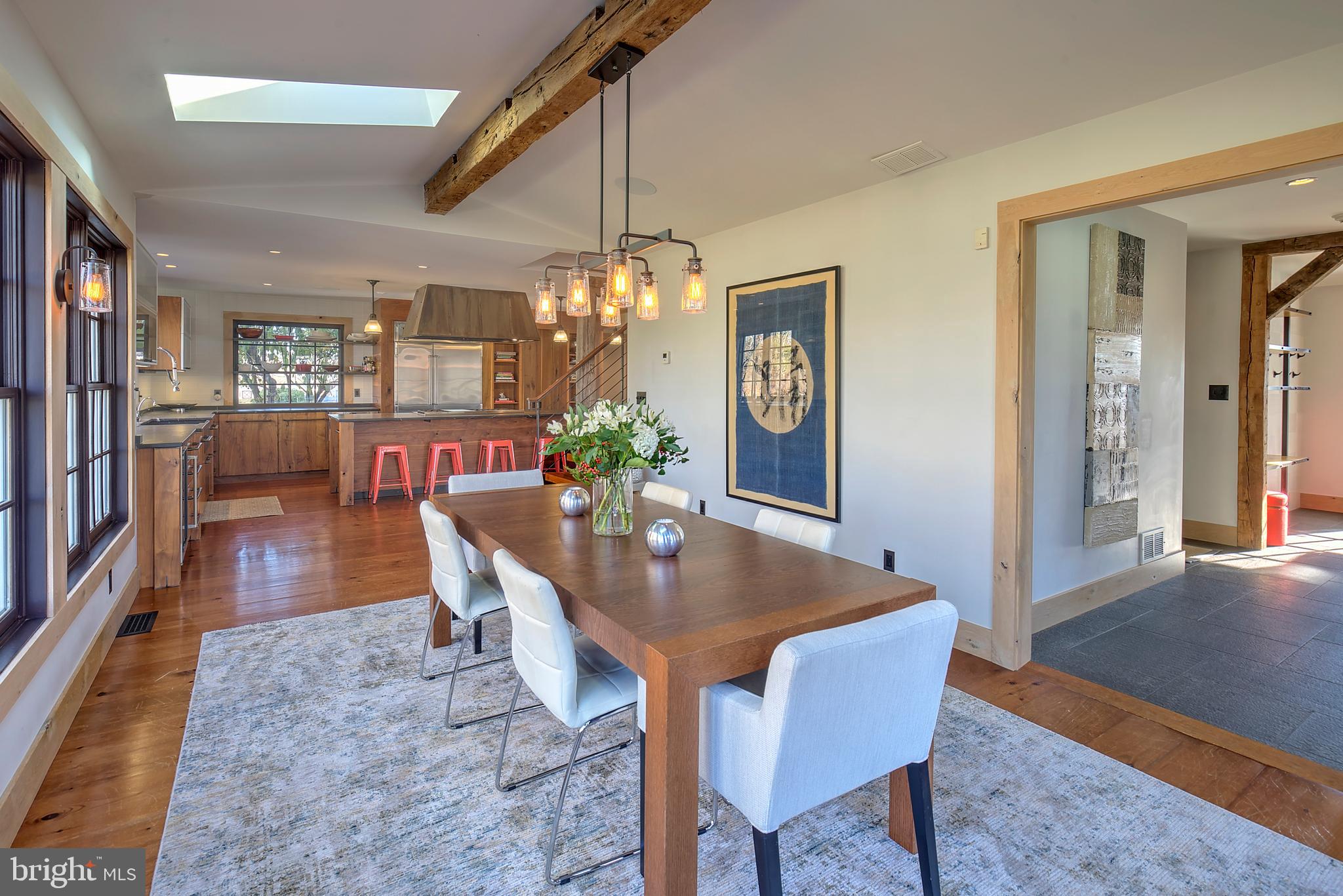 266 Province Line Road Skillman, NJ 08558 - Photo 8 of 71 a dining room with furniture a chandelier and wooden floor