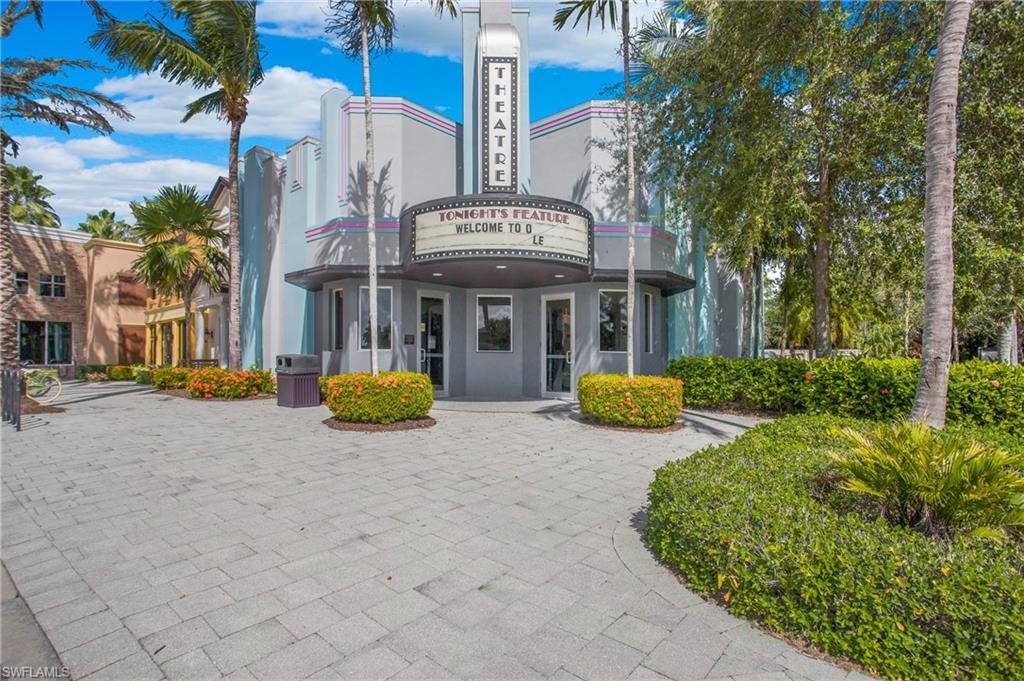 9063 Capistrano Street North, Unit 4408 Naples, FL 34113 - Photo 47 of 50 a view of a building with backyard