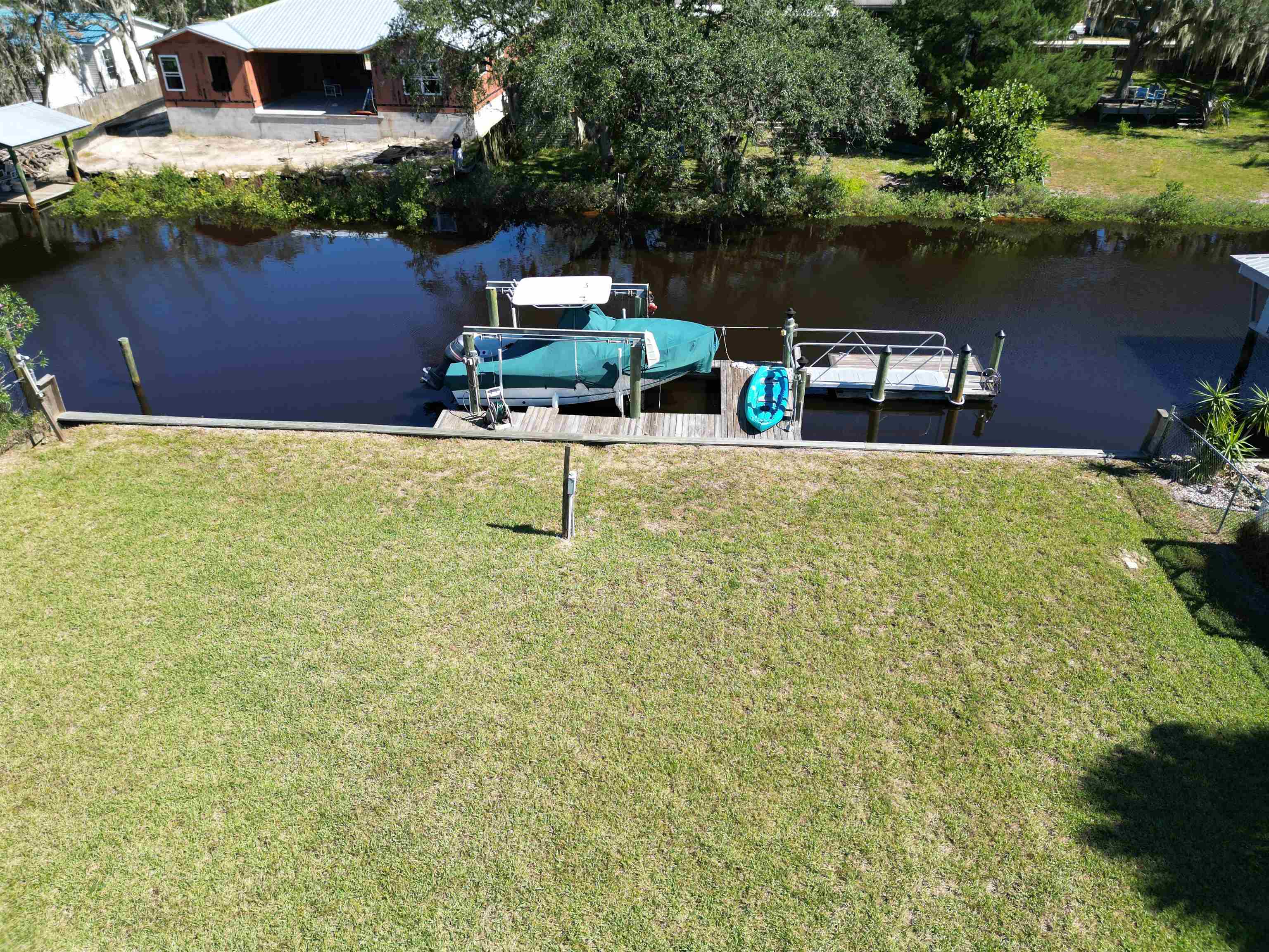 6314 Salado Road St. Augustine, FL 32080 - Photo 3 of 8 a garden view with a lake view