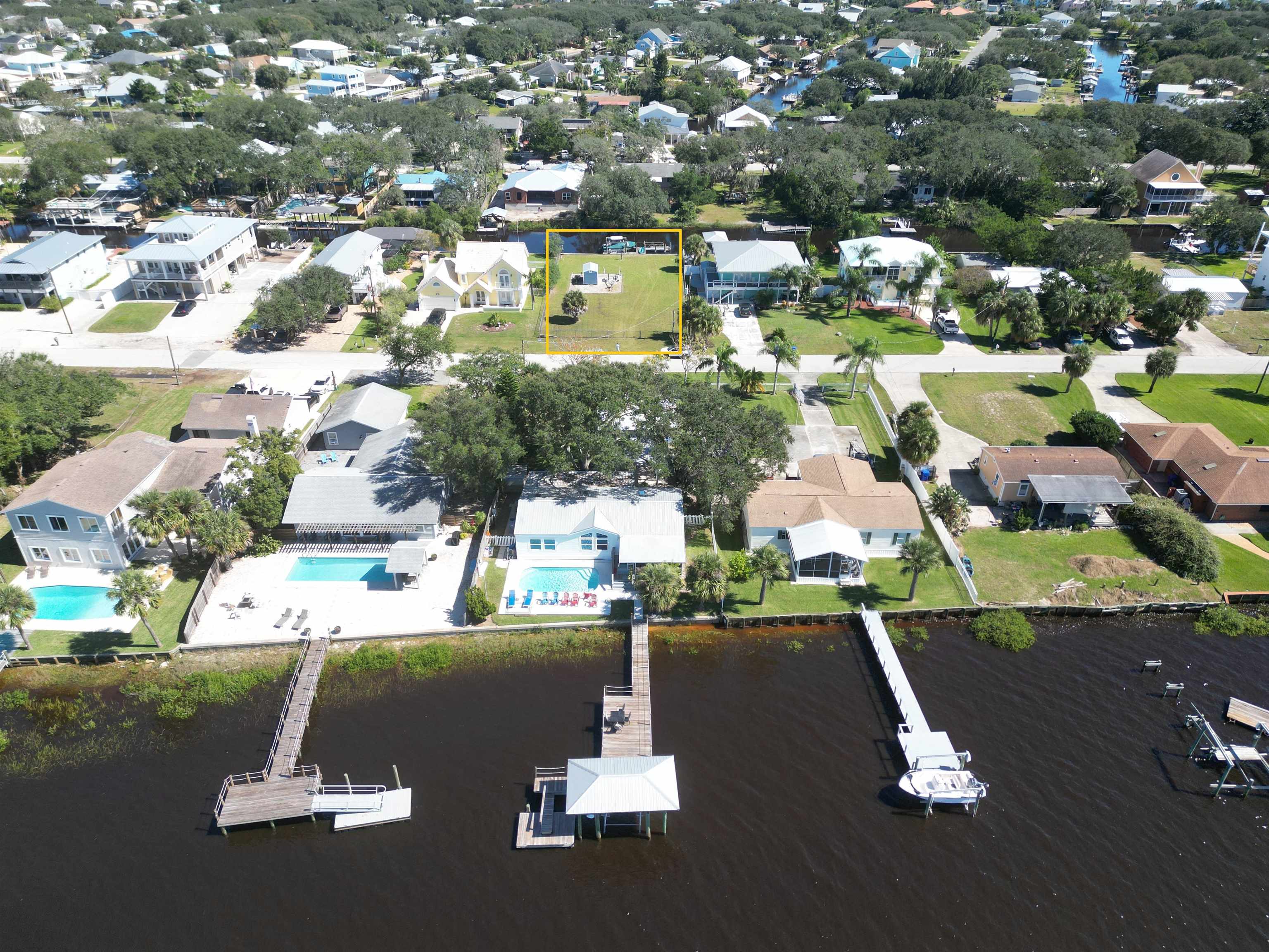 6314 Salado Road St. Augustine, FL 32080 - Photo 6 of 8 an aerial view of residential houses with outdoor space and parking