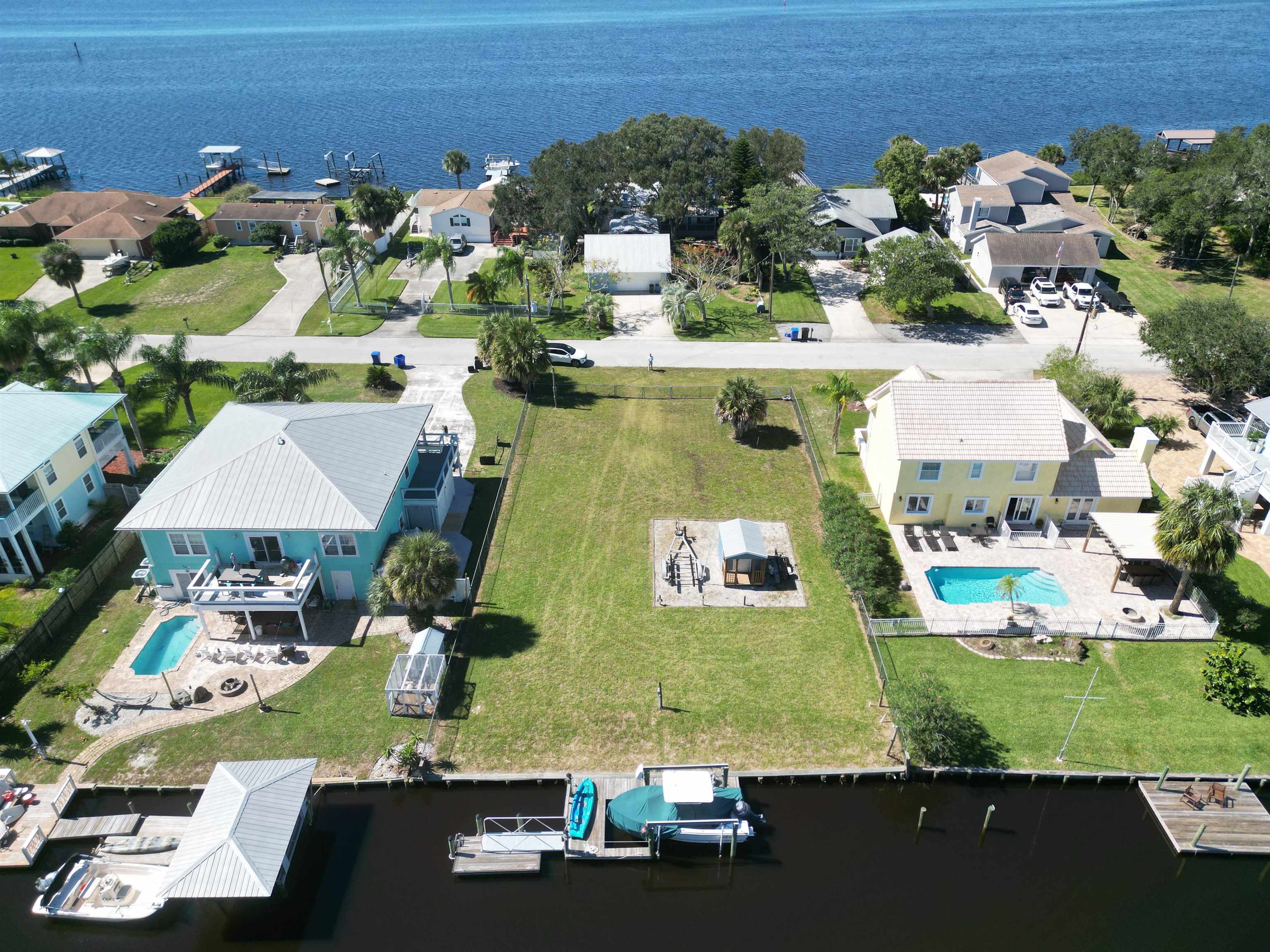 6314 Salado Road St. Augustine, FL 32080 - Photo 7 of 8 an aerial view of multiple houses with outdoor space