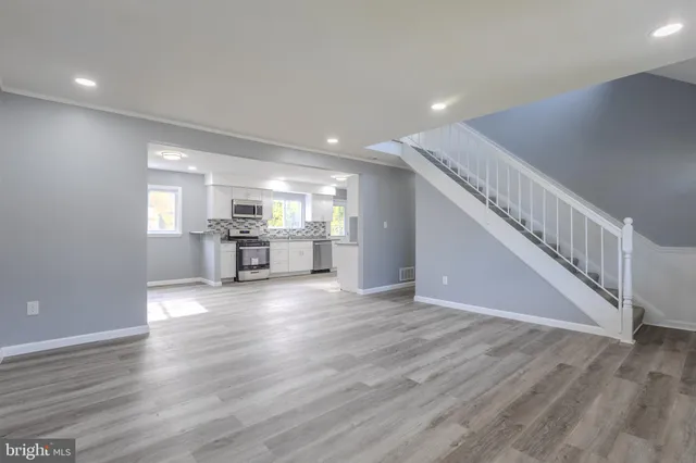 a view of kitchen with wooden floor
