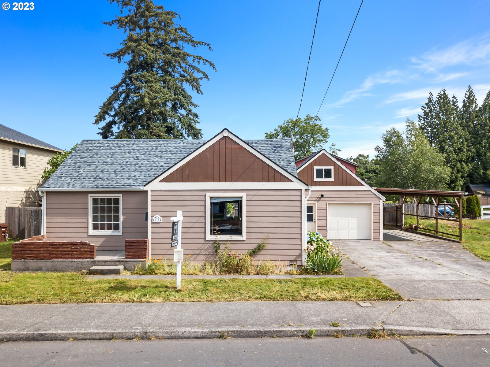 711 Southeast 5th Street Gresham, OR 97080 - Photo 7 of 8 a view of a house next to a yard