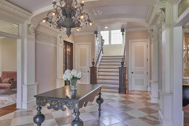 a view of a chandelier in a livingroom