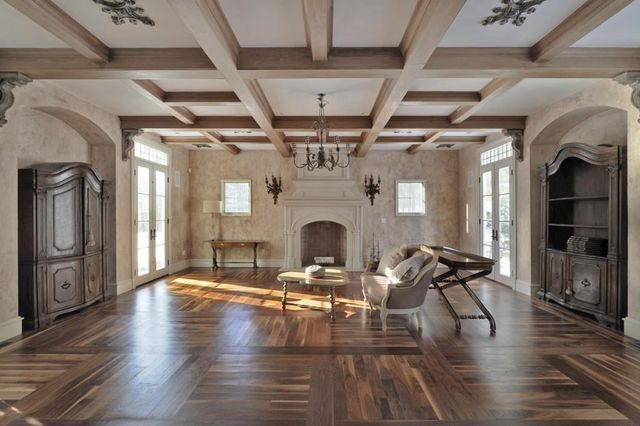 a living room with fireplace furniture and a fireplace