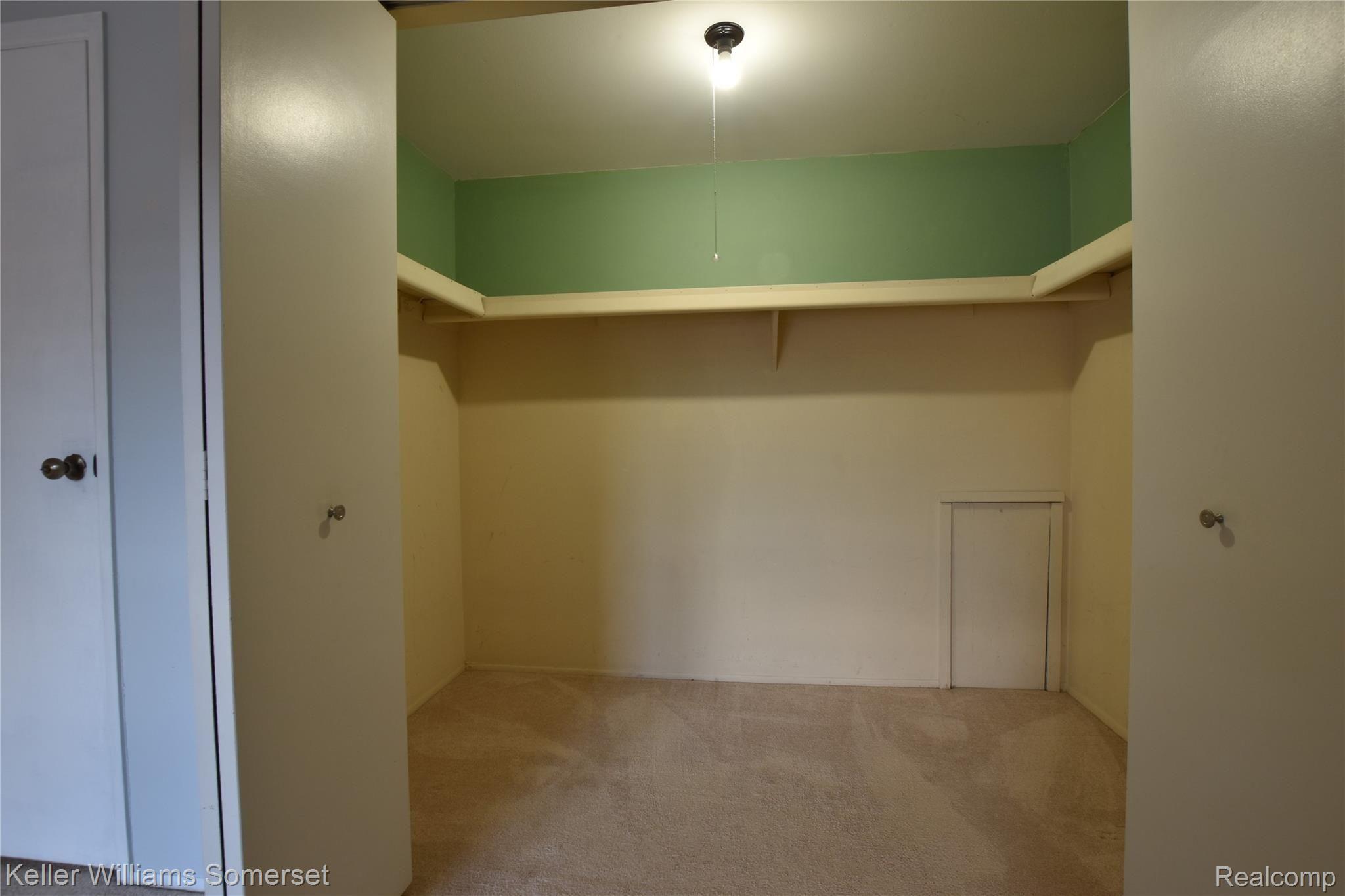 5075 Crooks Road, Unit 12 Royal Oak, MI 48073 - Photo 13 of 22 Spacious closet in the bedroom