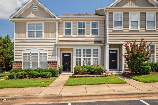 a front view of a house having yard