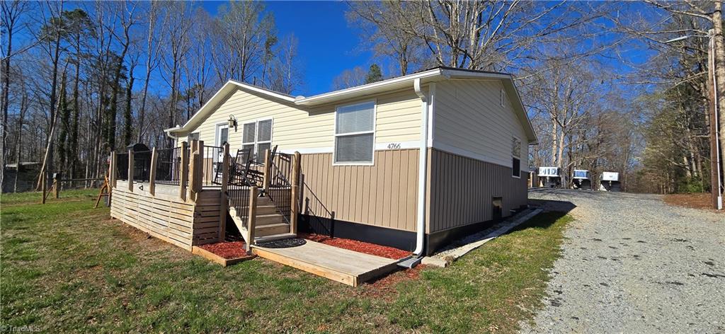 4766 Kennedy Road Trinity, NC 27370 - Photo 3 of 32 Updated manufactured home with views of horse pasture