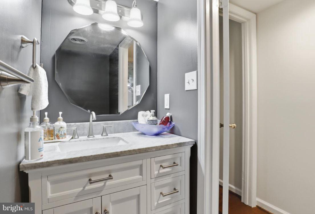211 Keyes Court Sterling, VA 20164 - Photo 18 of 37 Half bath on main level