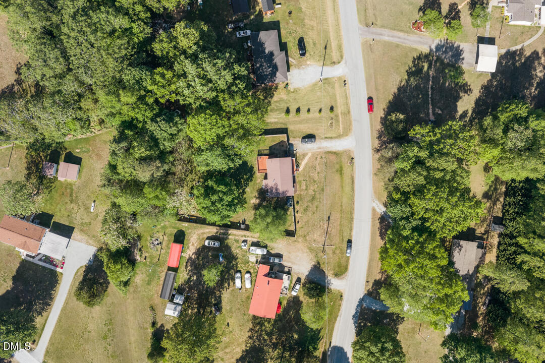 454 Cedar Creek Road Timberlake, NC 27583 - Photo 33 of 39 an aerial view of residential houses with outdoor space