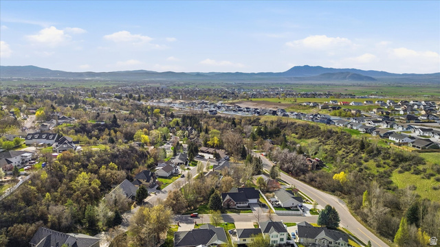 353 Robin Street Smithfield, UT 84335 - Photo 63 of 70 Aerial view of residential area featuring mountains