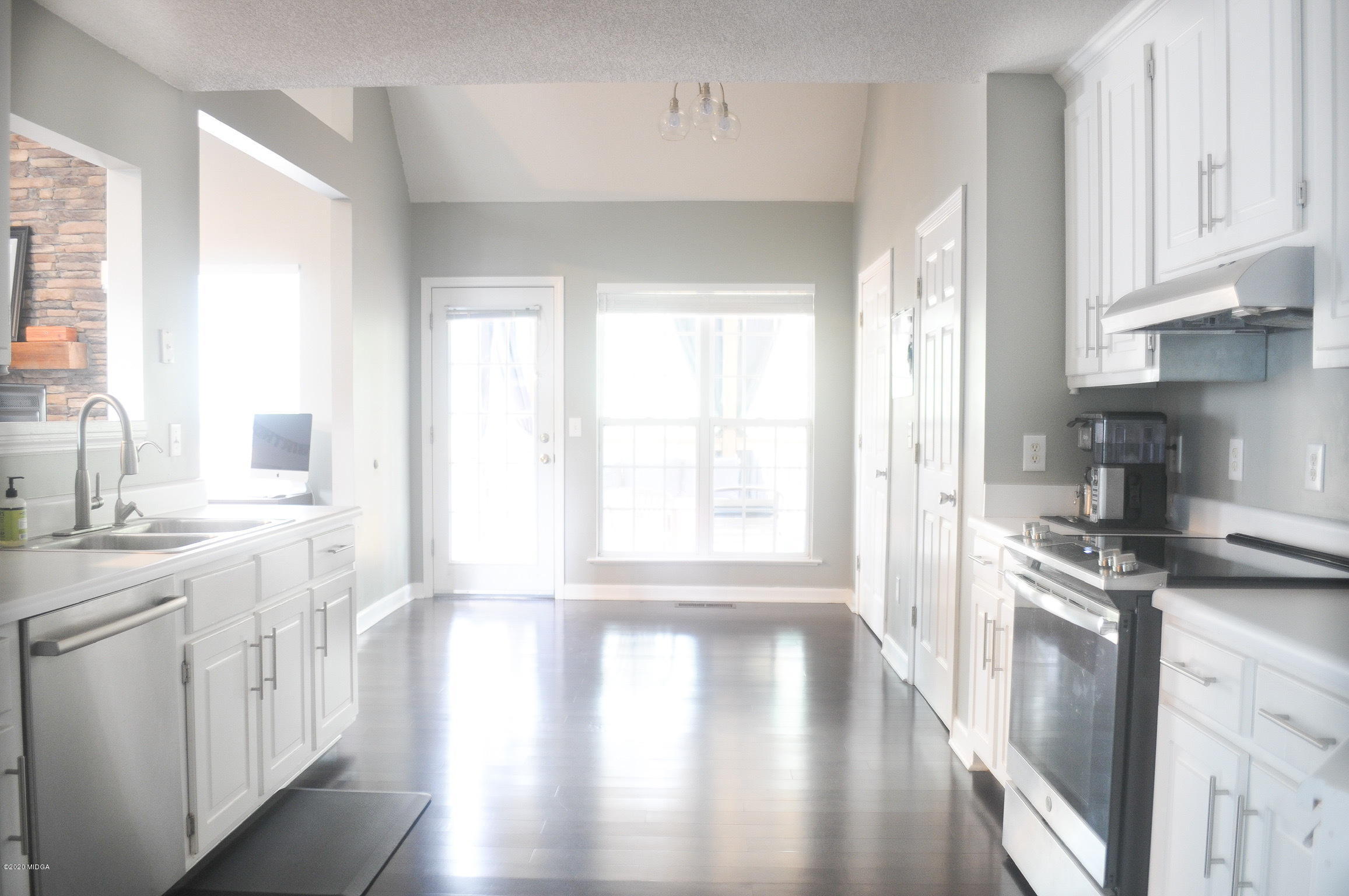 17 Old Benton Road Juliette, GA 31046 - Photo 2 of 19 a kitchen with stainless steel appliances a stove a sink and a refrigerator