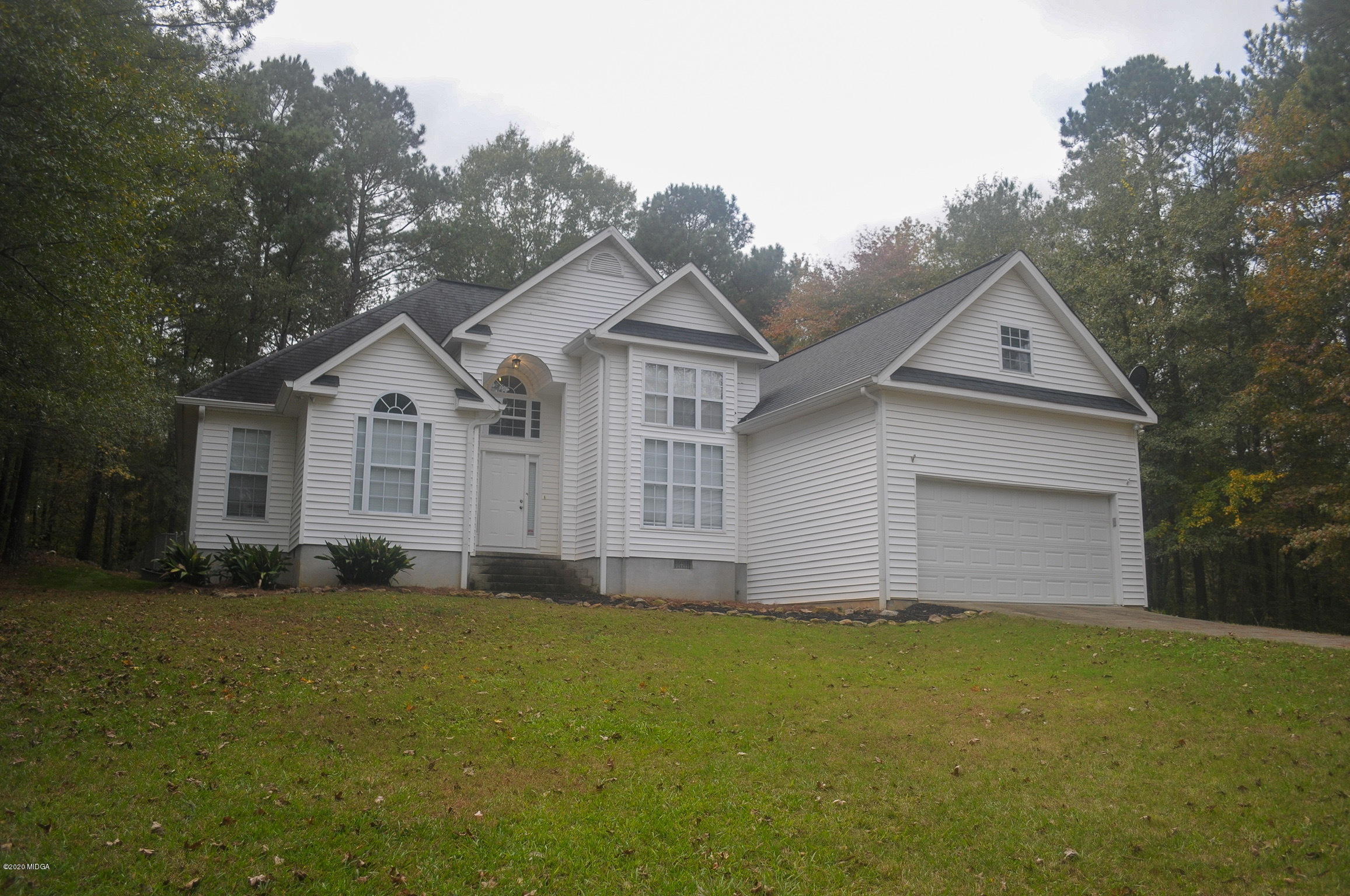 17 Old Benton Road Juliette, GA 31046 - Photo 18 of 19 a front view of house with yard and green space