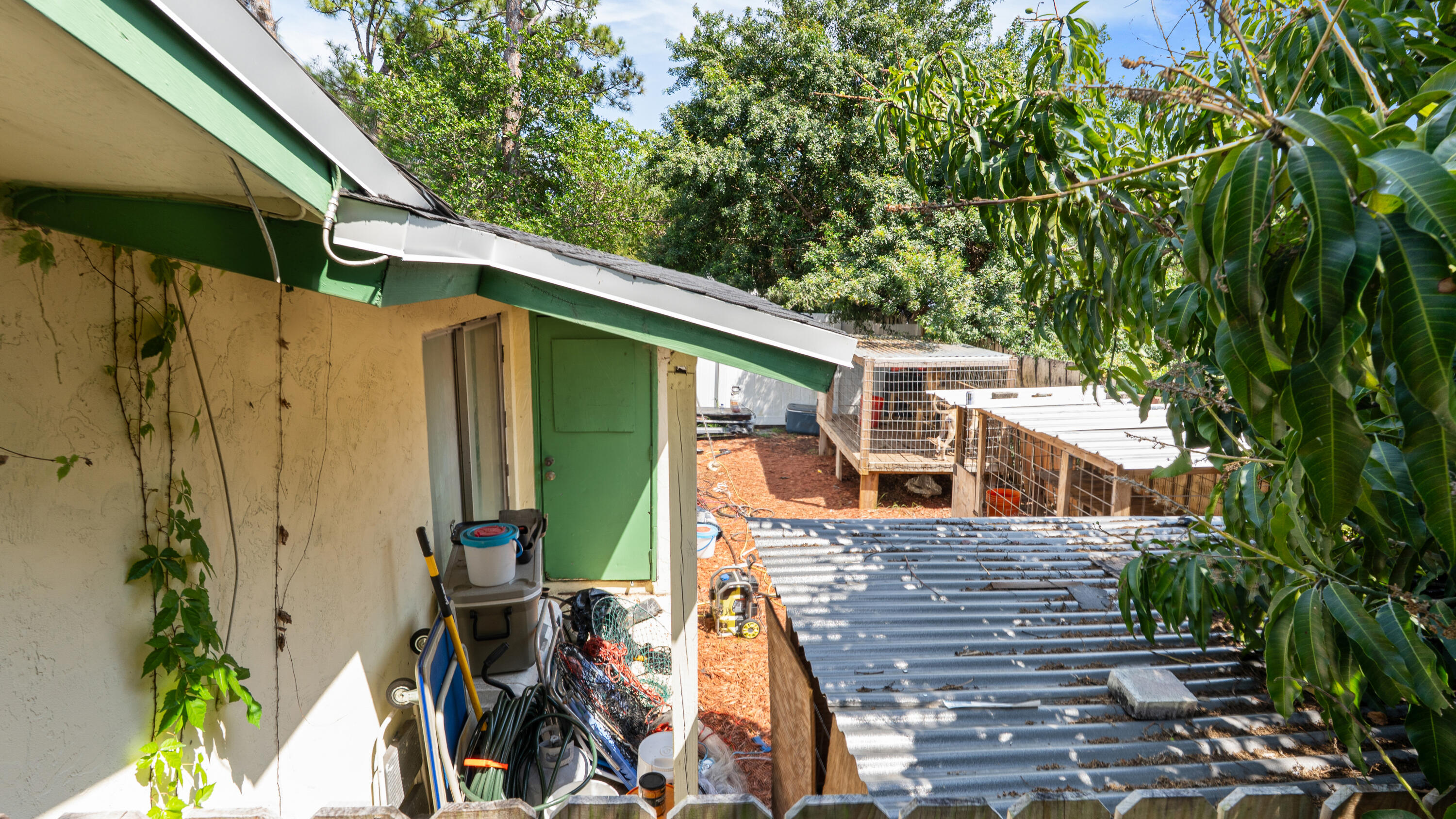 4453 Stevens Road Lake Worth Beach, FL 33461 - Photo 63 of 67 a view of a house with a backyard