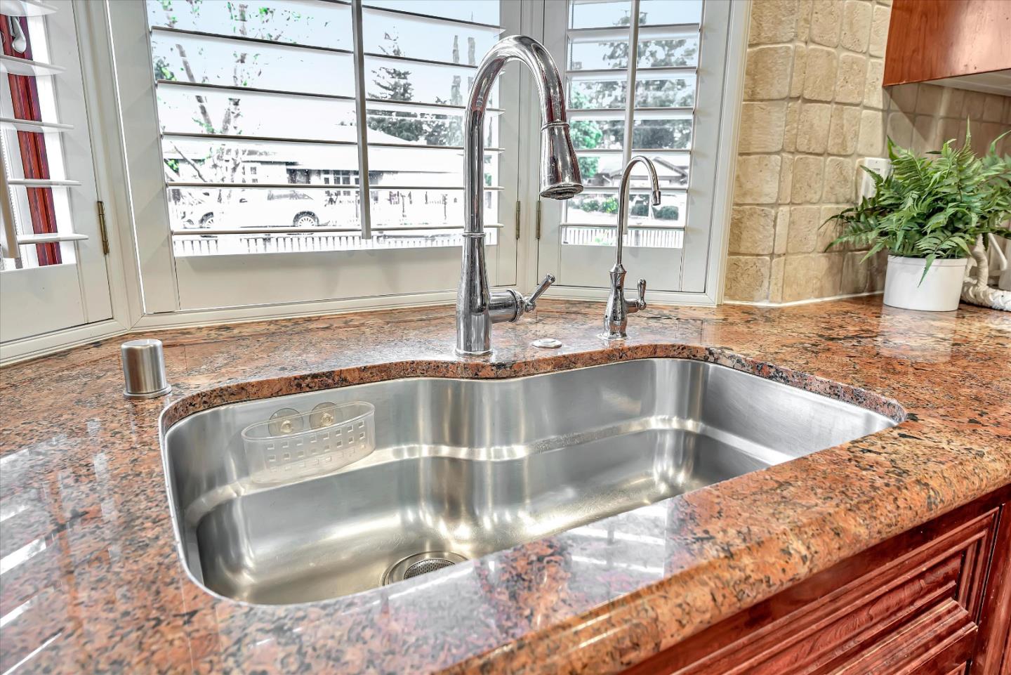 1623 Fallen Leaf Lane Los Altos, CA 94024 - Photo 19 of 62 a close view of sink and mirror