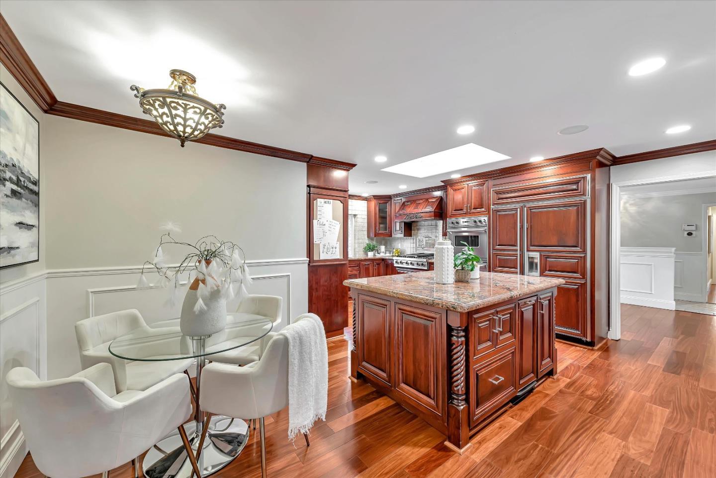 1623 Fallen Leaf Lane Los Altos, CA 94024 - Photo 26 of 62 a kitchen that has a table and chairs in it