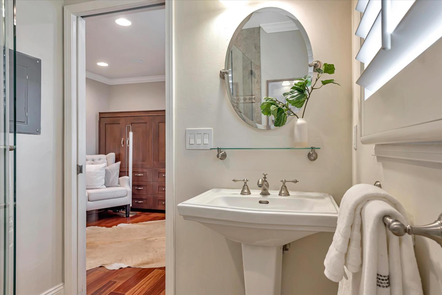 1623 Fallen Leaf Lane Los Altos, CA 94024 - Photo 49 of 62 a en suite bathroom with a sink and mirror