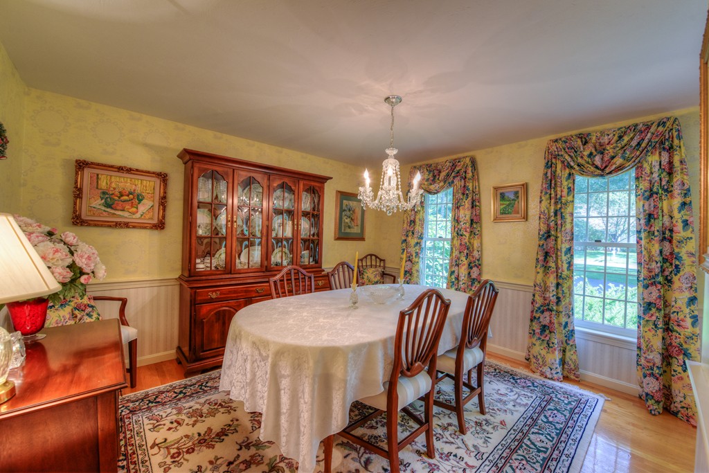 65 Tupelo Road Barnstable, MA 02635 - Photo 11 of 27 a view of a dining room with furniture window and wooden floor