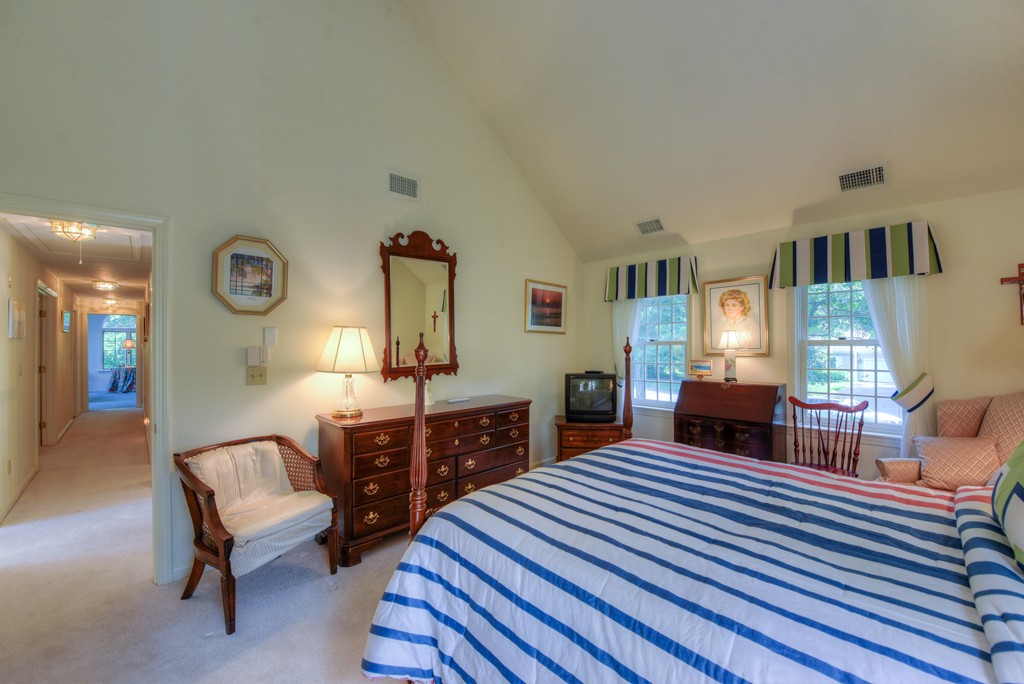 65 Tupelo Road Barnstable, MA 02635 - Photo 19 of 27 a bedroom with a bed and dresser
