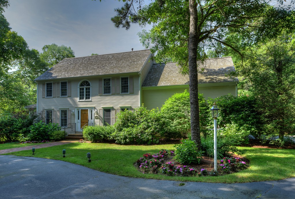 65 Tupelo Road Barnstable, MA 02635 - Photo 2 of 27 a front view of a house with a yard