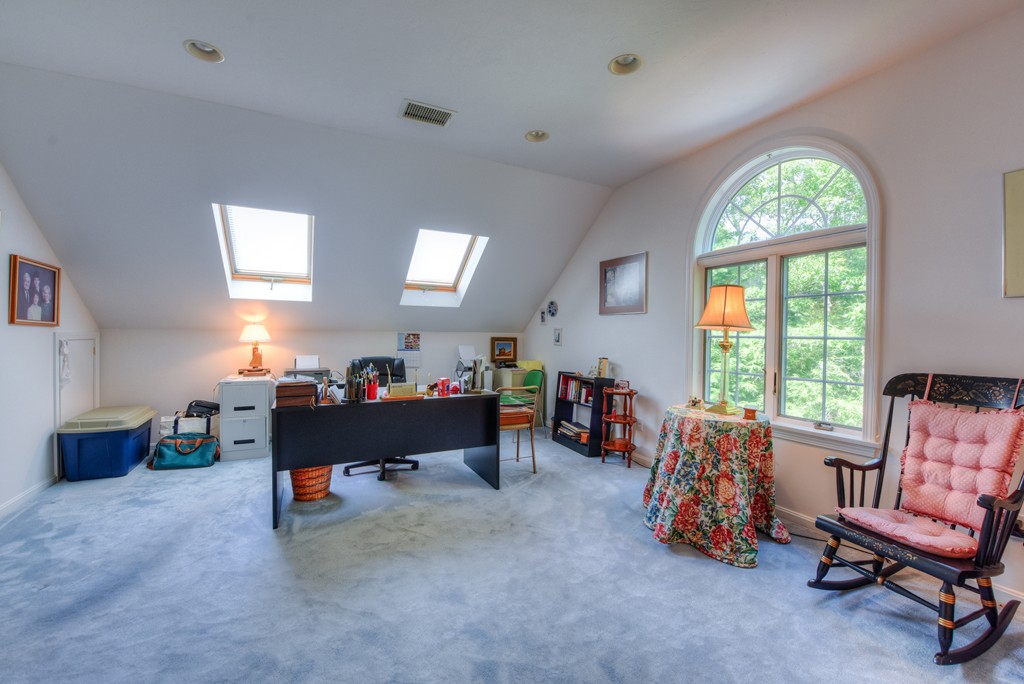 65 Tupelo Road Barnstable, MA 02635 - Photo 24 of 27 a living room with furniture and a large window