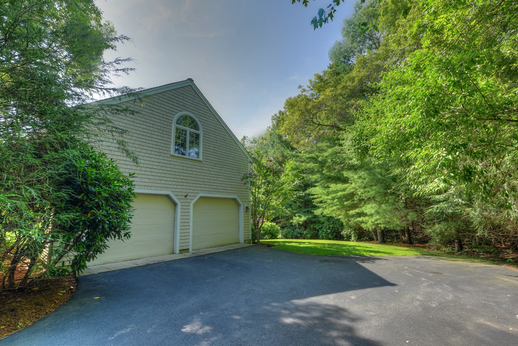 65 Tupelo Road Barnstable, MA 02635 - Photo 3 of 27 a house with a yard