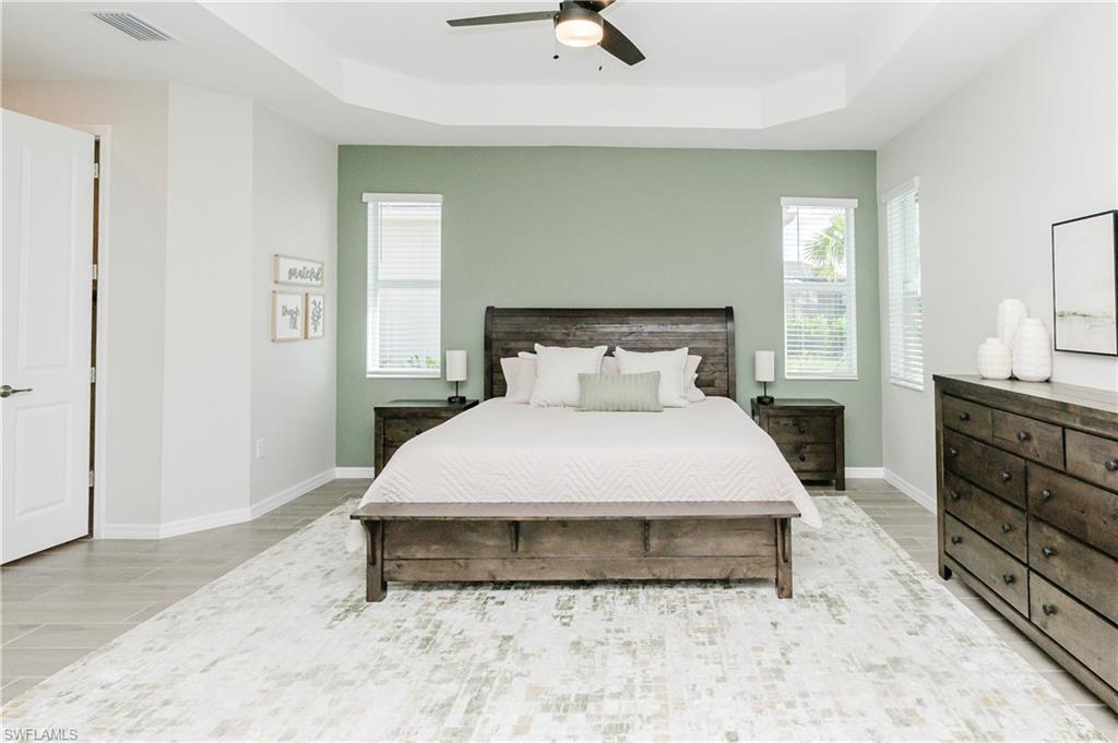 15862 Sugar Hl Drive Babcock Ranch, FL 33982 - Photo 14 of 50 a bedroom with a bed and window