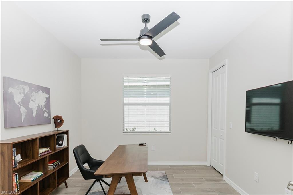 15862 Sugar Hl Drive Babcock Ranch, FL 33982 - Photo 23 of 50 a workspace with furniture and a window