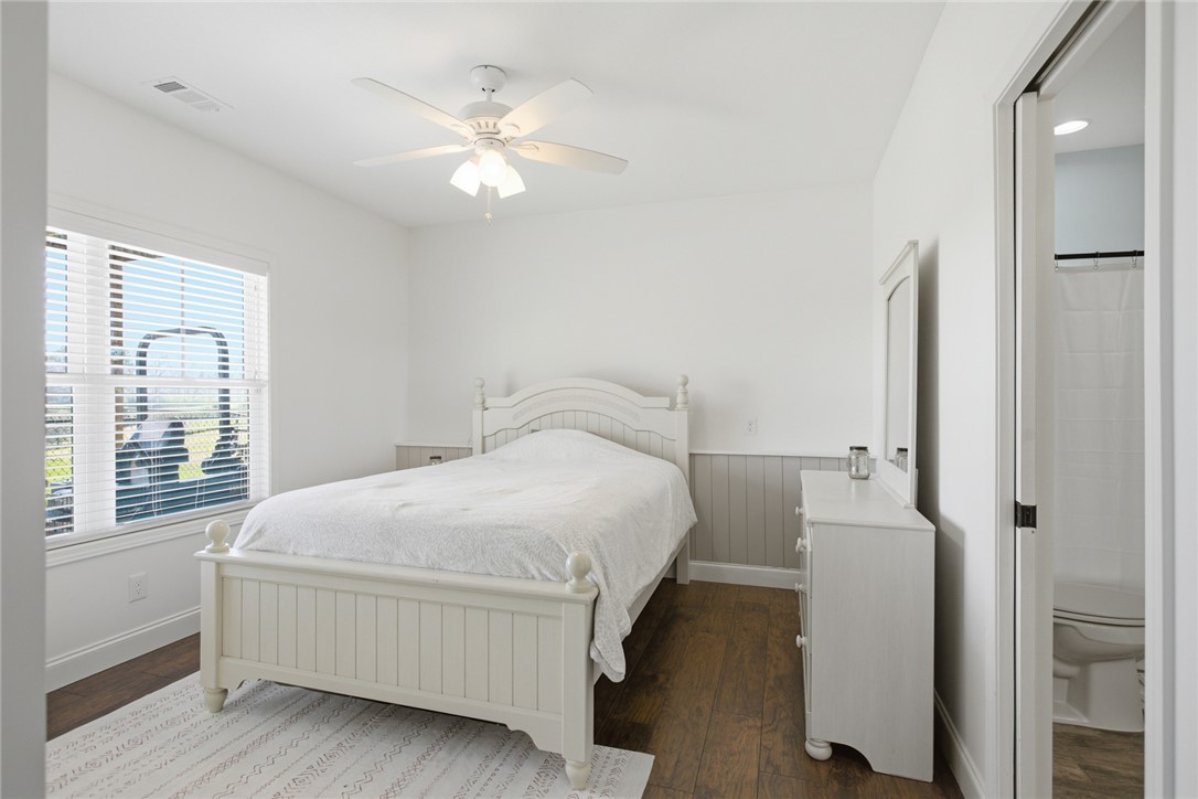 426 Oak Creek Road Seneca, SC 29678 - Photo 26 of 50 This cozy bedroom features durable wood flooring and a refreshing ceiling fan.
