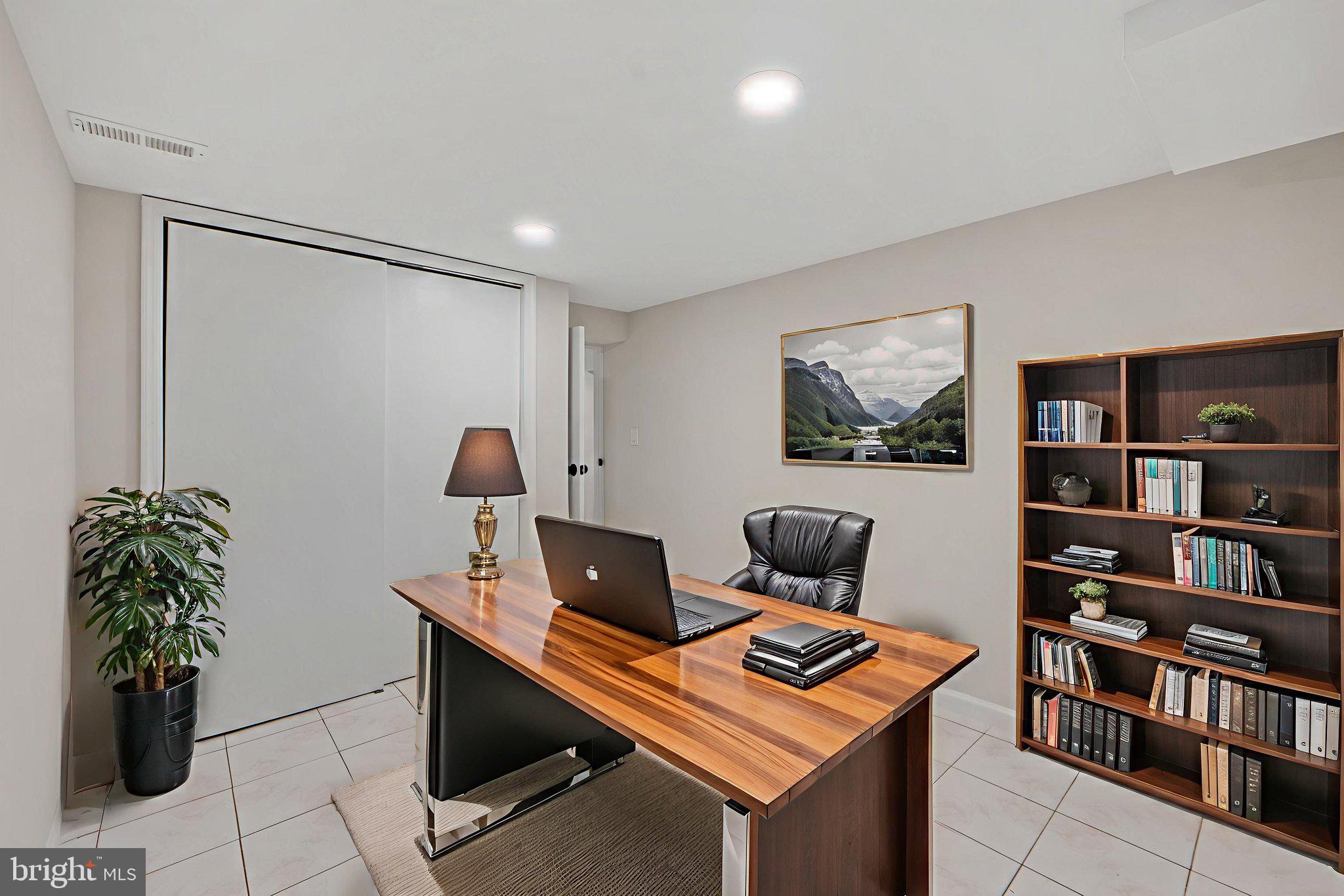 1513 Flora Lane Silver Spring, MD 20910 - Photo 41 of 49 a room with furniture and a potted plant