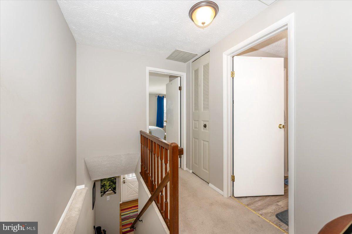 6813 Farmbrook Court Frederick, MD 21703 - Photo 20 of 40 a view of a hallway with entryway