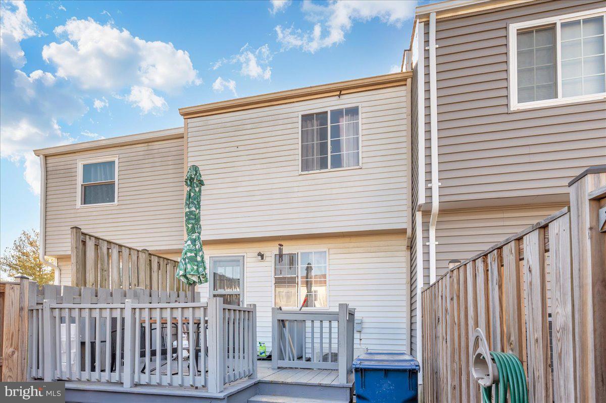 6813 Farmbrook Court Frederick, MD 21703 - Photo 34 of 40 a view of a house with a deck