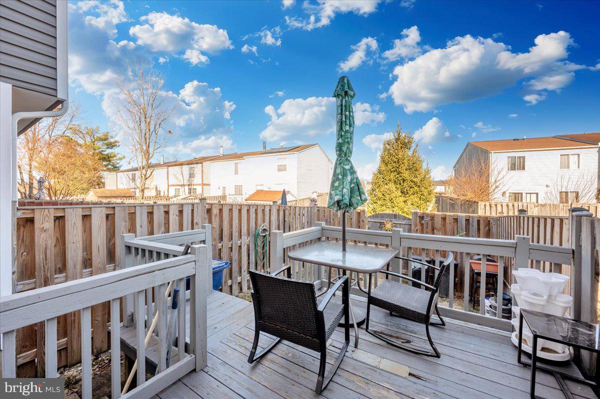 6813 Farmbrook Court Frederick, MD 21703 - Photo 35 of 40 a view of a balcony with furniture