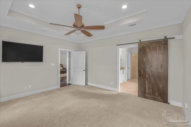 a view of an empty room with a fireplace