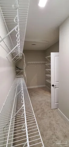 a view of a balcony with wooden floor