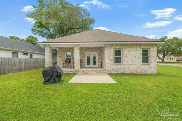 front view of a house with a yard