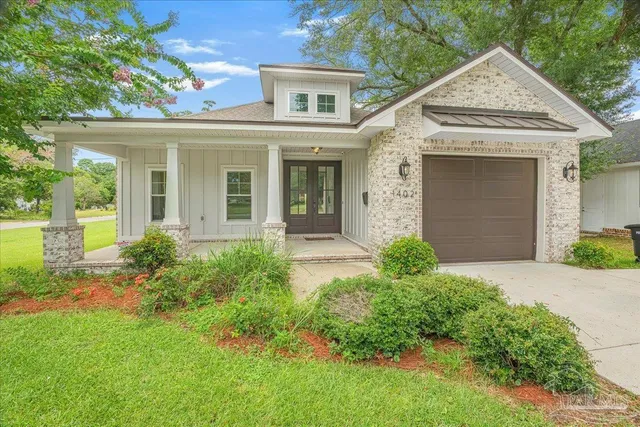front view of a house with a yard